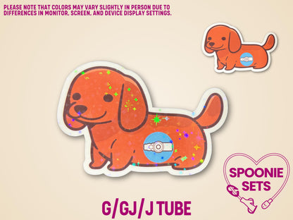 Orange dachshund sticker with a feeding tube, holographic glitter, and white border.