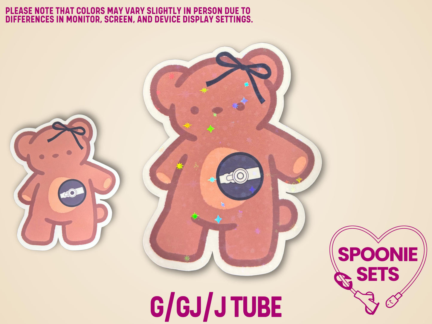 Two matte pink teddy bear stickers with a feeding tube design and holographic glitter.