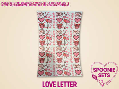 Valentine's Day tubie tape with pink hearts, envelopes, balloons, and gift boxes on white Hypafix.