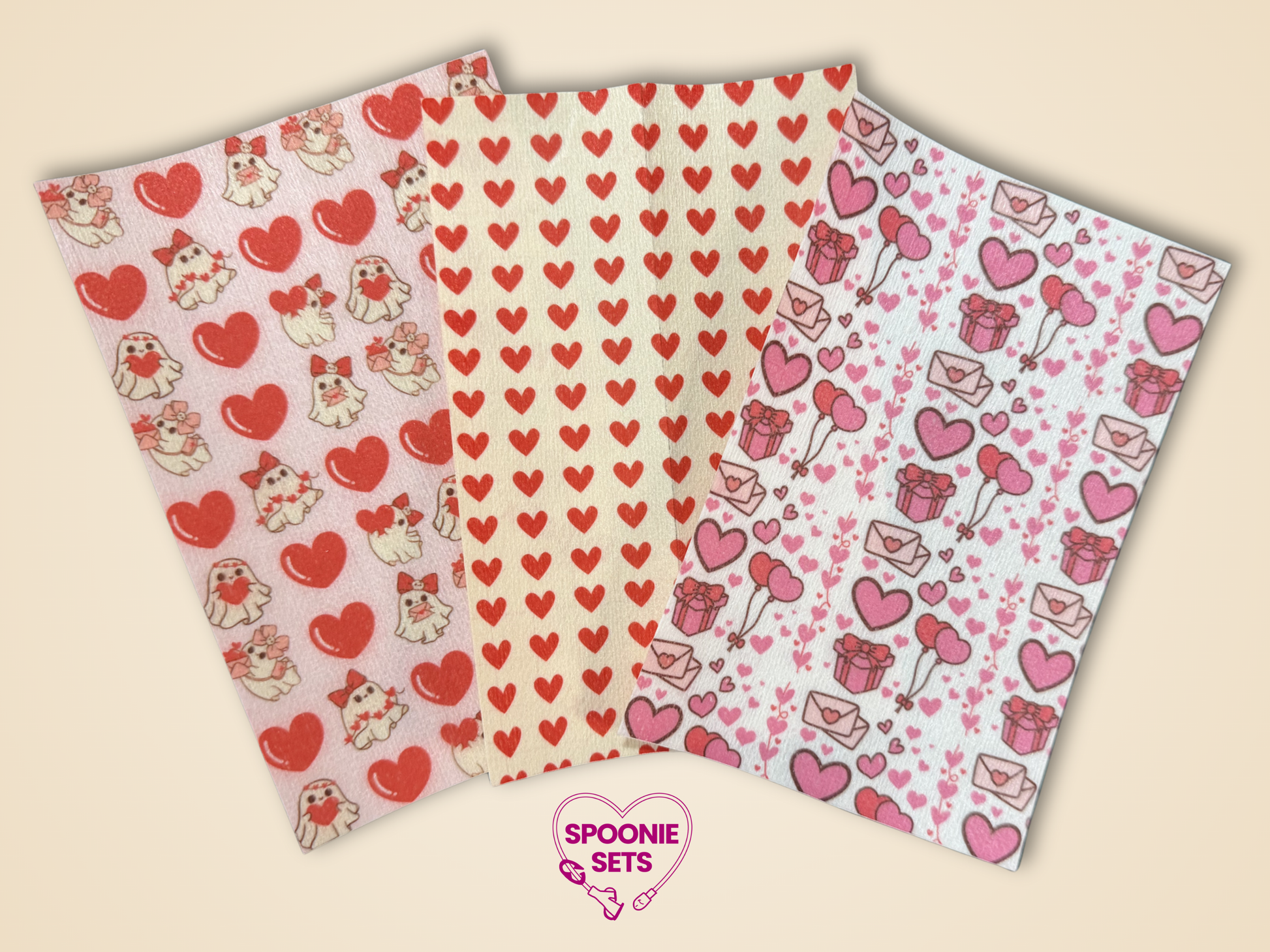 Three sheets of Valentine's Day tubie tape with red hearts, pink balloons, gift boxes, and cute animal designs.