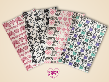 Three sheets of Hypafix tubie tape: pixel art cat, gaming items, and "Level Up" game consoles.