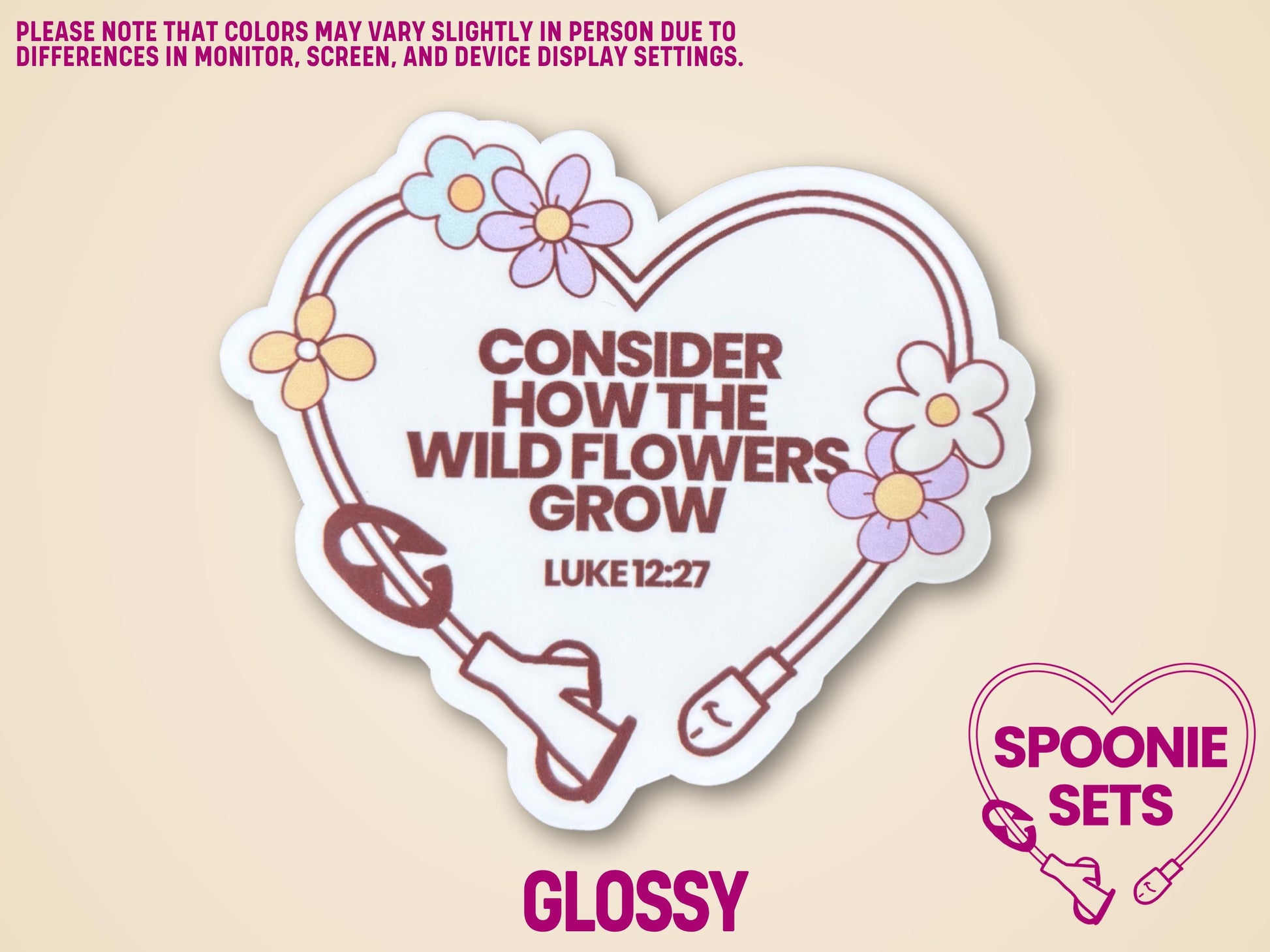 Heart-shaped sticker with a feeding tube design, wildflowers, and "Consider How The Wild Flowers Grow Luke 12:27" text.