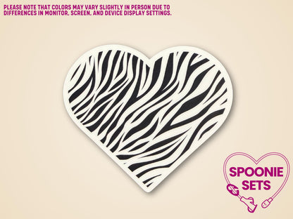 Heart-shaped sticker with black-and-white zebra print for rare disease and Ehlers-Danlos syndrome awareness.